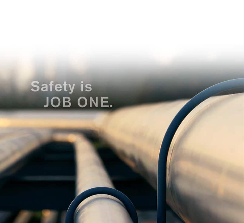 Steel industry piping with caption workplace safety is job ONE