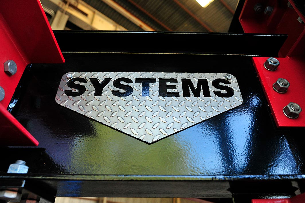 Systems logo plate mounted on one many engineered product solutions for the steel industry