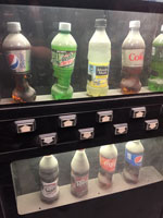 sodas in dust laden vending machine